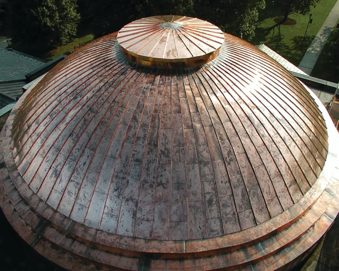 Craftsman Roofing crew installing a new roof in Royal Oaks